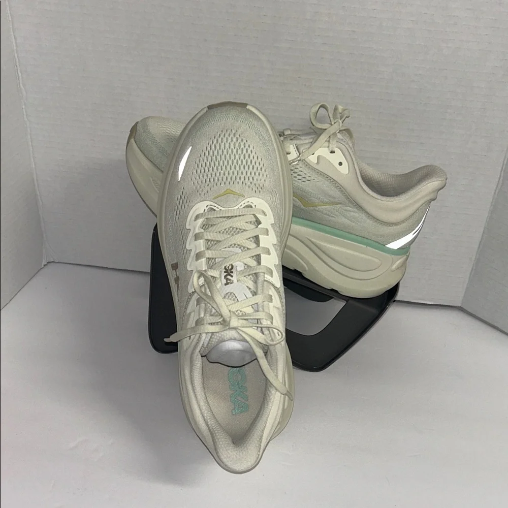 Hoka Off-White and Light Green Athletic Shoes